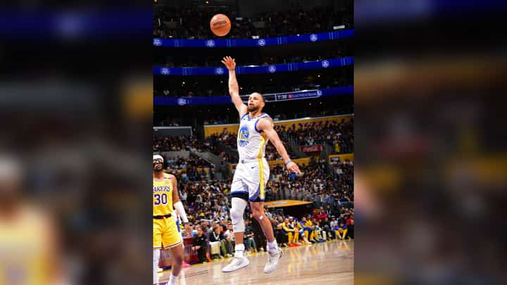 Stephen Curry dominates, firing 37 points to lift the Golden State Warriors to a 123-116 triumph over the Los Angeles Lakers in the NBA regular season.