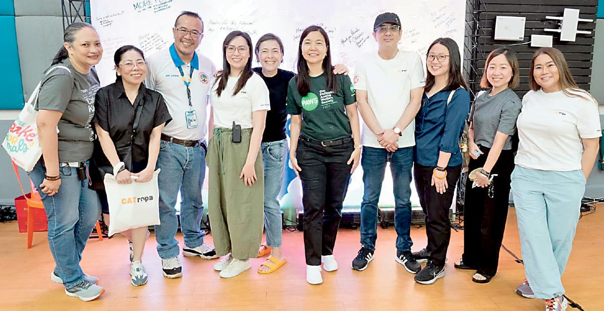 Seen in the photo (from left) are Cats of Kapitolyo founder Sharon Rodil, Cats of Ortigas founder Trixie de Guzman, Mandaluyong City Veterinarian Dr. Louie Encarnacion, Meralco Animal Welfare Advocacy program manager and head of Advocacy Communications Management Michelle Caguioa, Biyaya Animal Care president and co-founder Rina Ortiz, PAWS executive director Atty. Anna Cabrera, Meralco vice president and head of Corporate Communications Joe R. Zaldarriaga, Barkmission representative Bea Lim and Adopt.ph representative Chloe Lim after signing Meralco’s pledge wall as a commitment to advancing animal welfare.