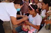 Vaccine drive A baby receives an immunization shot as part of the Department of Health Western Visayas' initiative to fully vaccinate 93,175 infants this year, aiming to combat vaccine-preventable diseases.