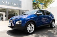 A VINFAST VF5 is parked outside a service center, as the brand gears up to expand its EV support network across the Philippines through a new partnership with JIGA.