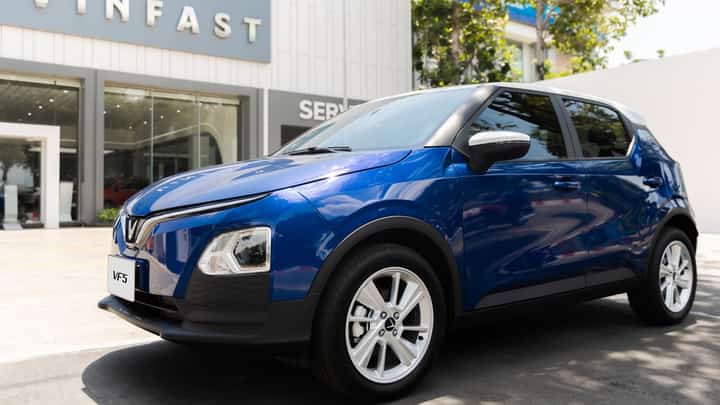 A VINFAST VF5 is parked outside a service center, as the brand gears up to expand its EV support network across the Philippines through a new partnership with JIGA.