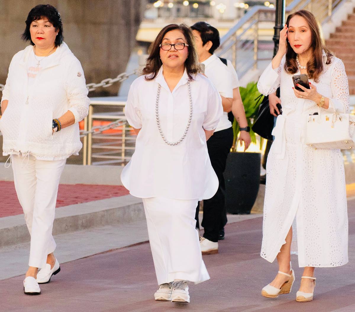 Cynthia Daniels, Katrina Ponce Enrile and Honorary Consul of Gambia Agnes Huibonhoa.