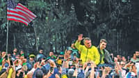 (FILES) Brazil’s former president Jair Bolsonaro greets supporters next to his son Renan during a rally at Paulista Avenue in Sao Paulo, Brazil.
