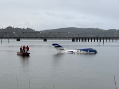 Five rescued after small jet plunges into bay at Oregon airport