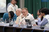Director of Public Policy for Southeast and South Asia at Meta, Dr. Rafael Frankel, and Meta’s Rob Abrams speak during the joint committee hearing of Public Order and Safety, DICT, and Public Information at the House of Representatives in Quezon City. Outside the venue, protesters tied white ribbons to condemn fake news, red-tagging, and stand in solidarity with EJK victims and others facing political persecution.