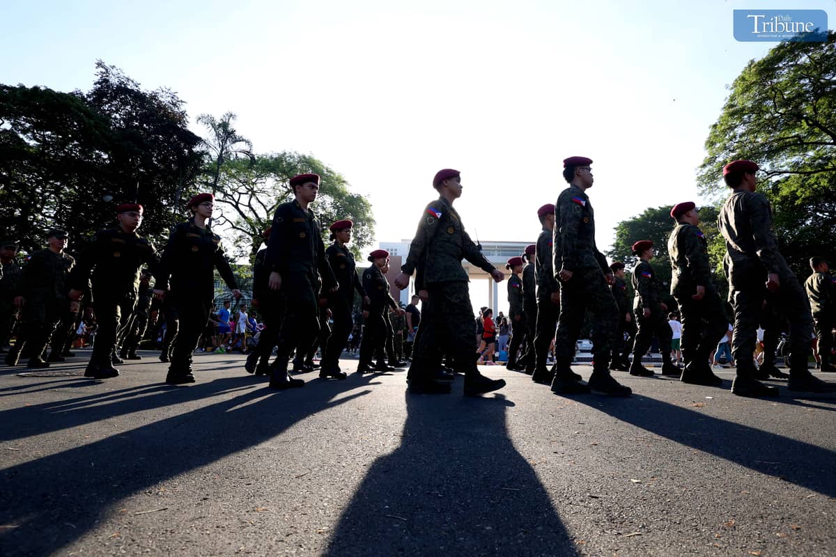 In celebration of Araw ng Kagitingan on Wednesday, 9 April 2025, members of the Philippine Army and ROTC contingents from various schools participate in the Freedom March around the academic oval of the University of the Philippines in Diliman, Quezon City.