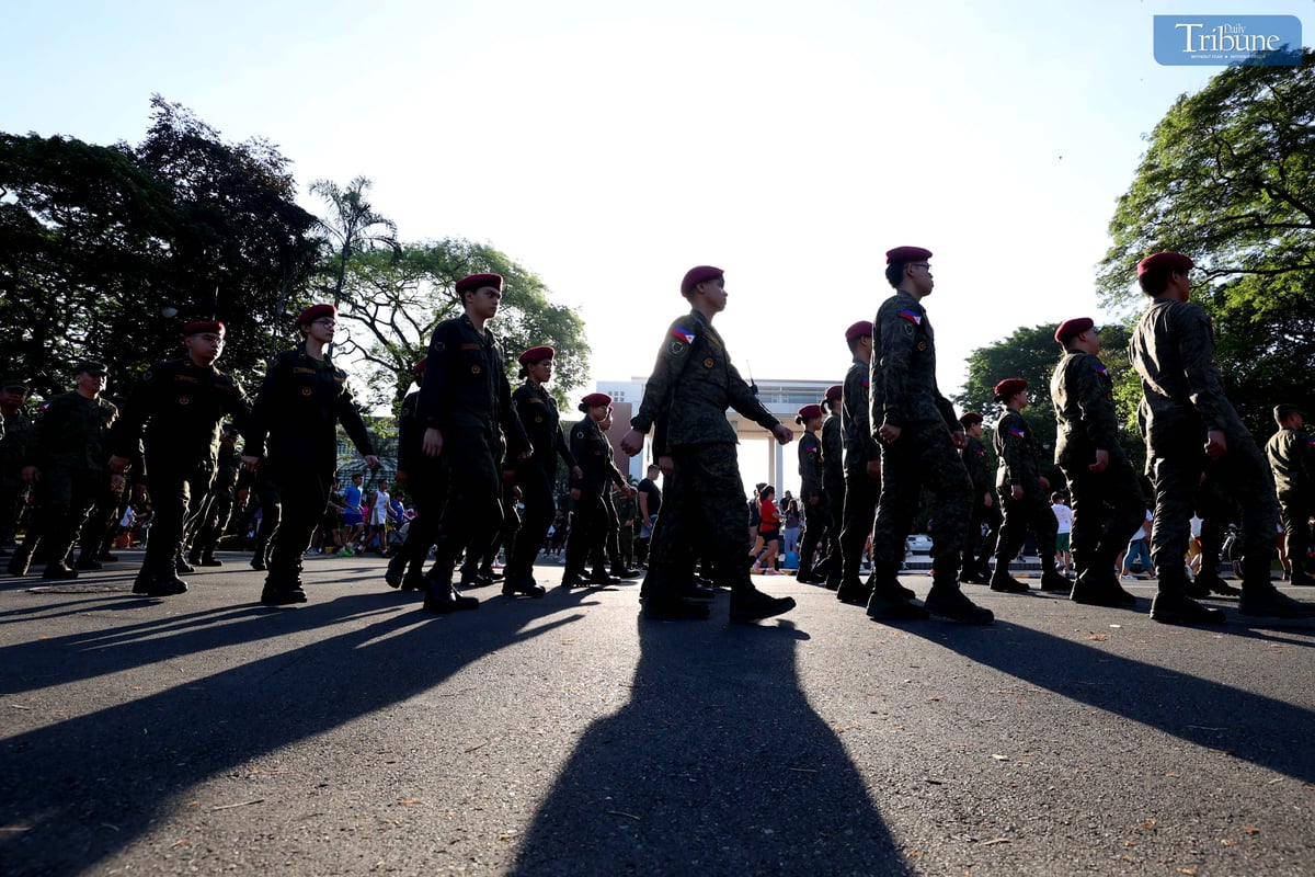 In celebration of Araw ng Kagitingan on Wednesday, 9 April 2025, members of the Philippine Army and ROTC contingents from various schools participate in the Freedom March around the academic oval of the University of the Philippines in Diliman, Quezon City.