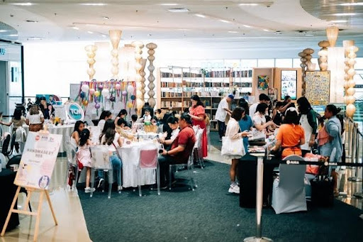 The vibrant arts and crafts session at Book Nook SM Aura transforms the space with creative energy, laughter, and proudly handmade masterpieces.