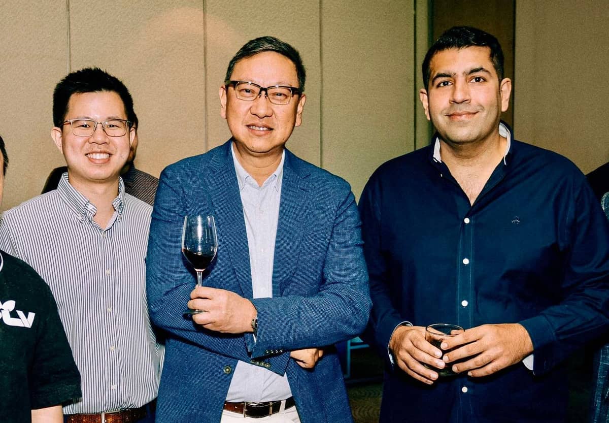 Mark and Emerson Yao with Rajiv Dargani.