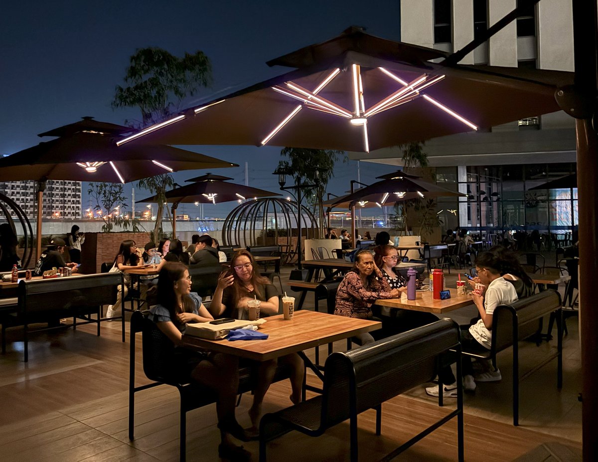Integrating sustainability, SM City Bicutan offers solar-powered parasols with nighttime illumination in its Sky Garden.