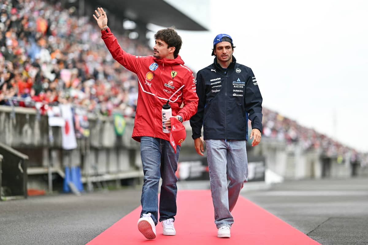 MONEGASQUE driver Charles Leclerc and Williams’ Spanish driver Carlos Sainz wave to the spectators.