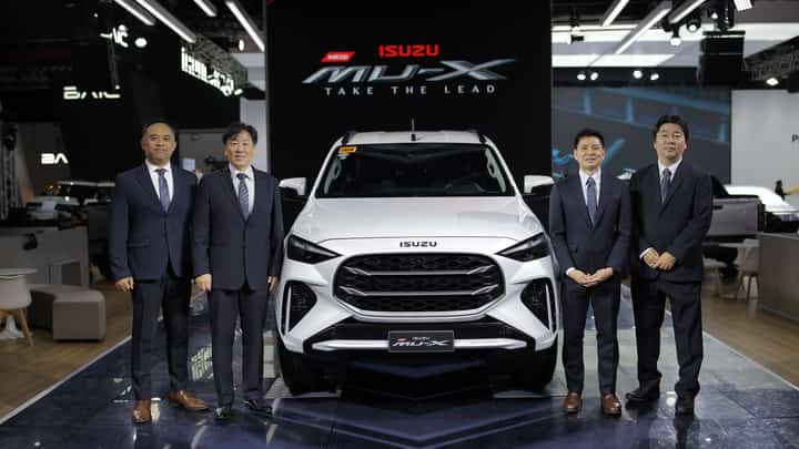 SHOWN are: (from left) Isuzu Philippines Corporation sales division head Robert Carlos, IPC president Mikio Tsukui, IPC executive vice president Yasuhiko Oyama and IPC vice president for Sales Toshihiko Kojima.