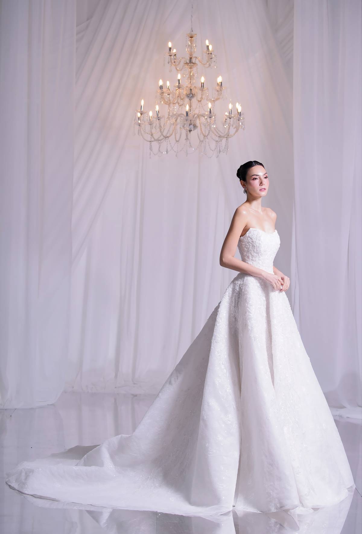 Strapless corseted fully embroidered with french and chantilly lace ball gown.