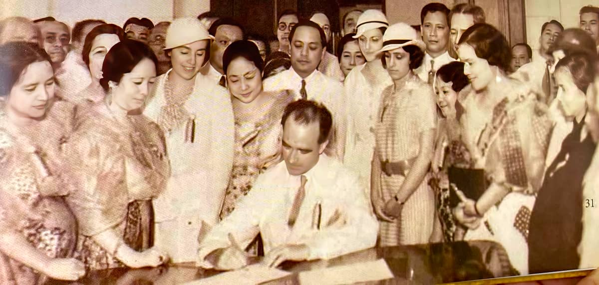 American Governor General Charles Yeater signs Executive Order 33 which declares Mother’s Day in the Philippines as initiated by the Women’s Club of the Province of Ilocos Norte led by Enriqueta de Peralta, who is shown in the photo at rightmost, wearing black.