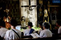 (April 14 2025) Devotees take part in a “pabasa” at the Holy Family Parish in Quezon City on Holy Monday April 14 2025, as part of the Holy Week observance. pabasa is a Filipino catholic tradition where verses from the “Pasyong Mahal,” a narrative on the life, passion, death, and resurrection of Jesus Christ. Photo/Analy Labor