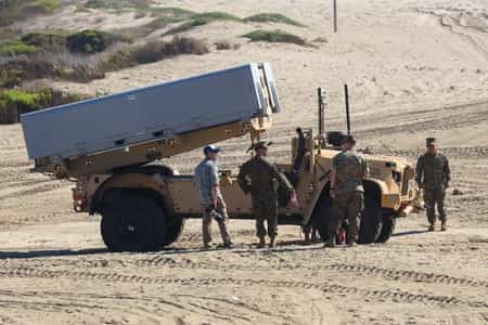 United States Marines with I Marine Expeditionary Force, deploy a Navy Marine Expeditionary Ship Interdiction System (NMESIS) during Project Convergence 2022 (PC22) on Marine Corps Base Camp Pendleton, California, Oct. 18, 2022. (FILE PHOTO BY US Marine Corps photo by Sgt. Juan Magadan)