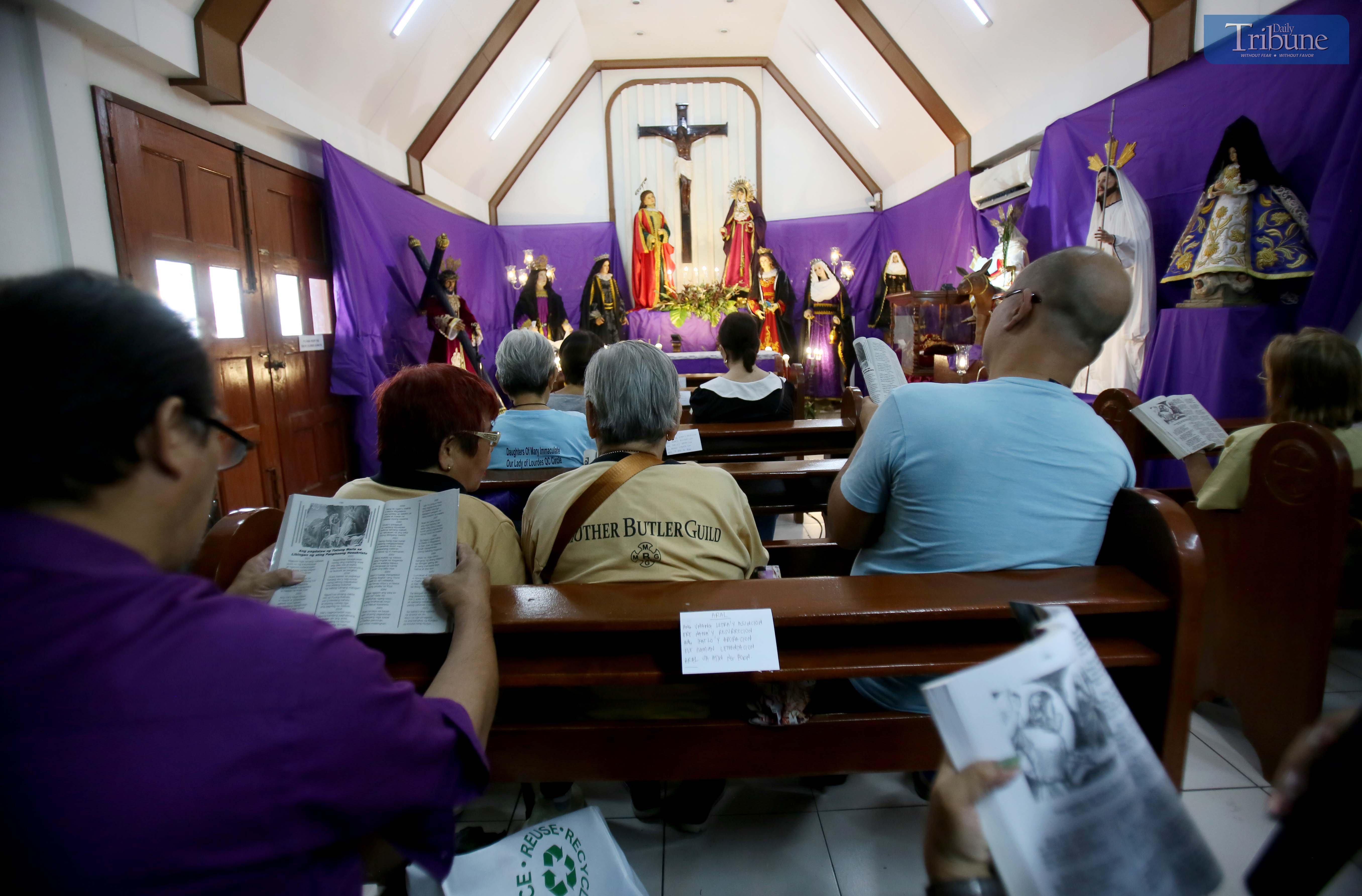 Devotees chant the Pasyon on Holy Tuesday in Quezon City