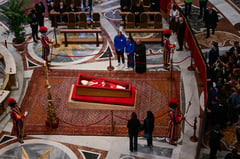 Huge crowds pack Vatican for last day of Pope's lying in state