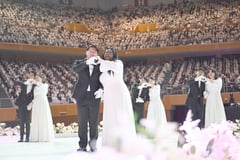 ‘Happiness, love’ at Moonie mass wedding after Japanese court blow