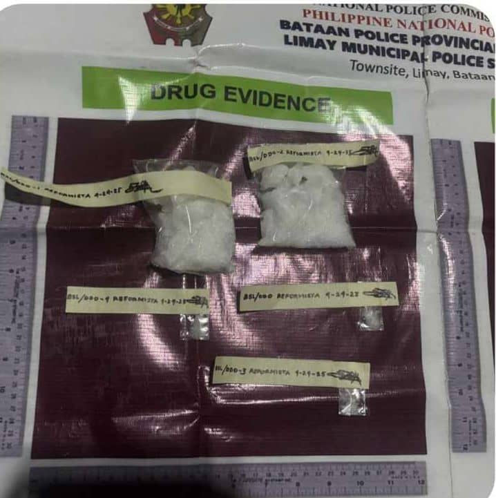 Several sachets of suspected shabu are displayed and labeled as drug evidence by the Limay Municipal Police Station in Bataan, with measuring guides and a backdrop identifying the location and date of confiscation.
