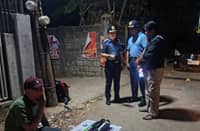 Police officers in Bataan present evidence following the arrest of a suspected high-value drug dealer in Limay, where over ₱1.19 million worth of suspected shabu was seized during a buy-bust operation.