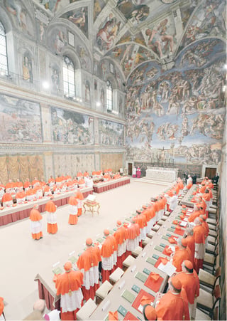 Cardinals line up in the Sistine Chapel to take an oath of secrecy before the start of the conclave to elect a new pope at the Vatican on 12 March 2013.