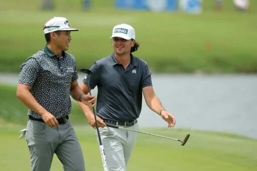 U.S. rookies fire record 58, pace PGA pairs tilt