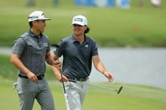 U.S. rookies fire record 58, pace PGA pairs tilt