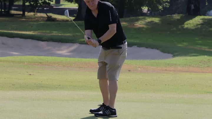 British Chamber of Commerce Philippines executive chairman Chris Nelson watches his putt on the first green during The Great British Golf Tournament at the West course of the Wack Wack Golf and Country Club in Mandaluyong on Thursday.