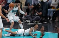 Ja Morant #12 of the Memphis Grizzlies reacts after falling during the first half of Game 3 against the Oklahoma City Thunder on April 24, 2025.