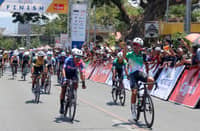 EAN Cajucom (right) of Victoria Sports celebrates while crossing the finish line of Stage 3 of the Tour of Luzon in San Juan, La Union on Saturday.