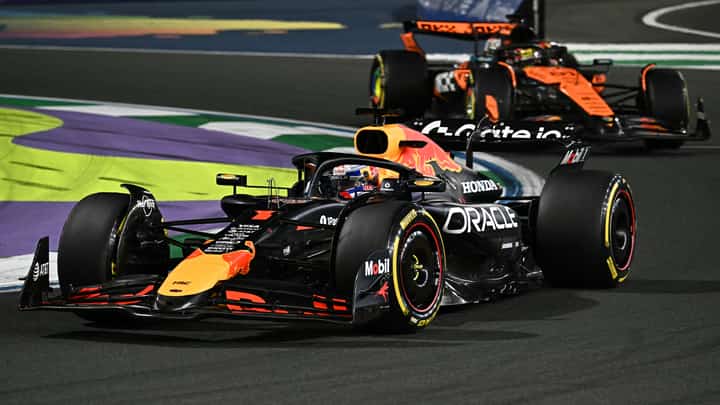 RED BULL Racing’s Dutch driver Max Verstappen and McLaren’s Australian driver Oscar Piastri race during the 2025 Saudi Arabia Formula One Grand Prix.