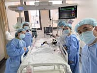 TWO-YEAR-OLD baby and the medical team from Chinese General Hospital and Medical Center after a successful liver transplantation at the Renji Hospital in Shanghai, China on 11 February 2025.