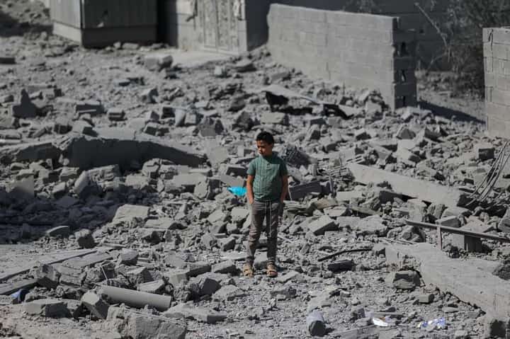 A young boy stands amid the destruction following overnight strikes attributed by the Yemeni media to the United States, in the Huthi-controlled capital Sanaa on April 27, 2025, that reportedly killed two people and wounded several others. The Huthis, who control large parts of war-torn Yemen, also reported strikes in other parts of the country, including their stronghold Saada in the north.