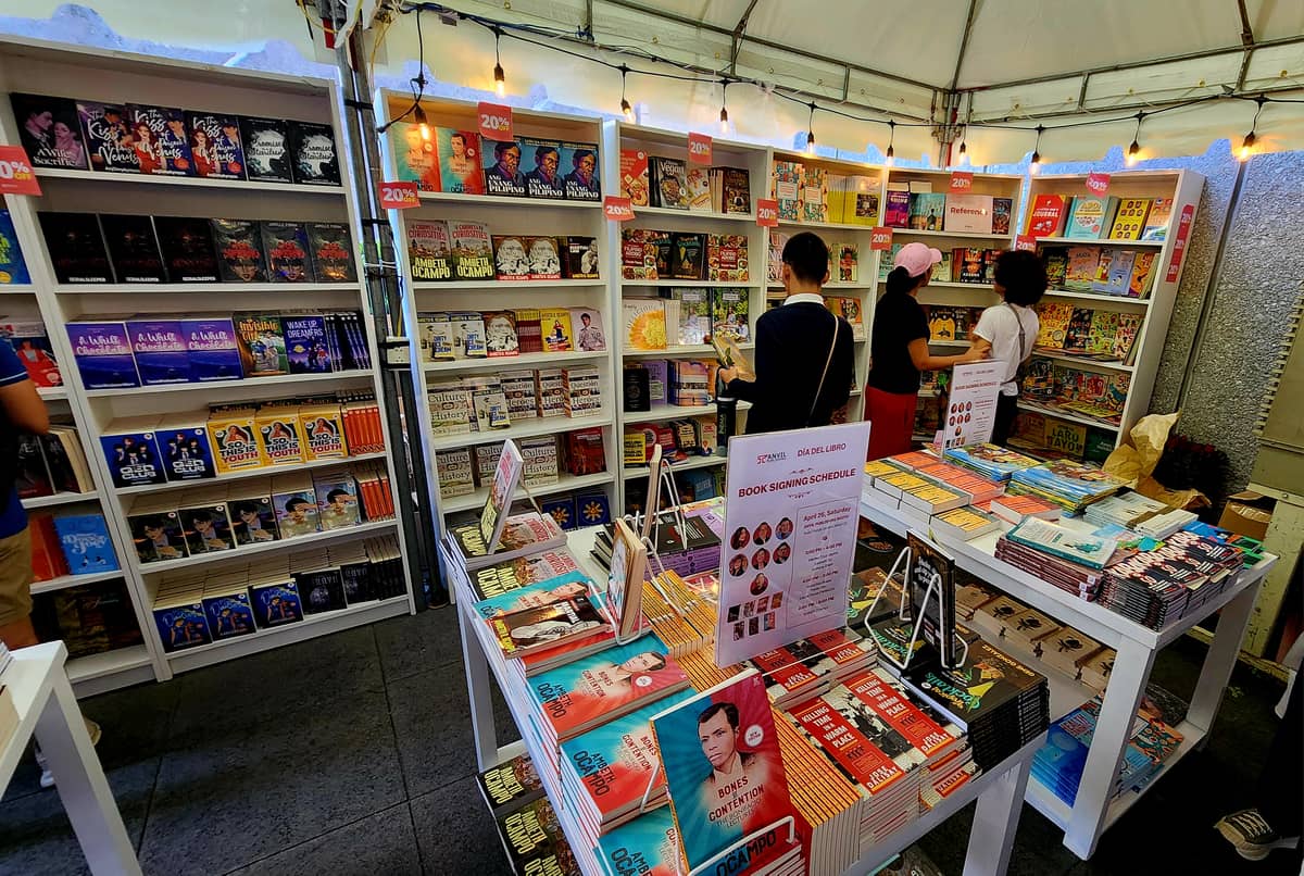 Visitors enjoy browsing for books at discounted prices.