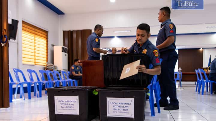 Bataan police personnel cast absentee votes