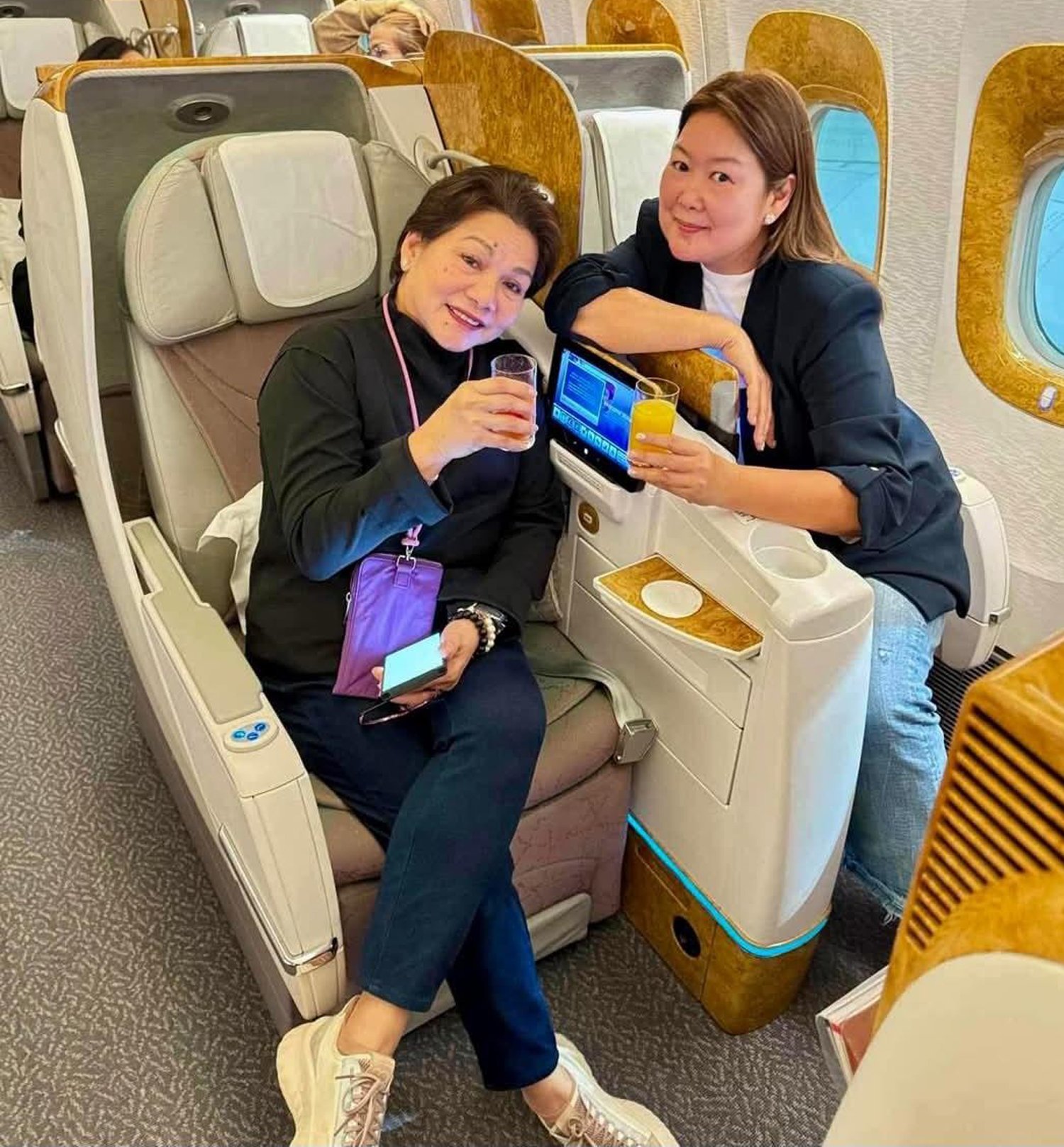 Marget Villarica and Debbie Huang catching flight and making memories.