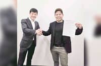 Two-division world champion Gerry Peñalosa (right) and Japanese promoter Tomoki Kameda strike a deal starring Filipino world title prospect Kenneth Llover.