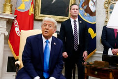 Top Trump security official replaced after chat group scandal