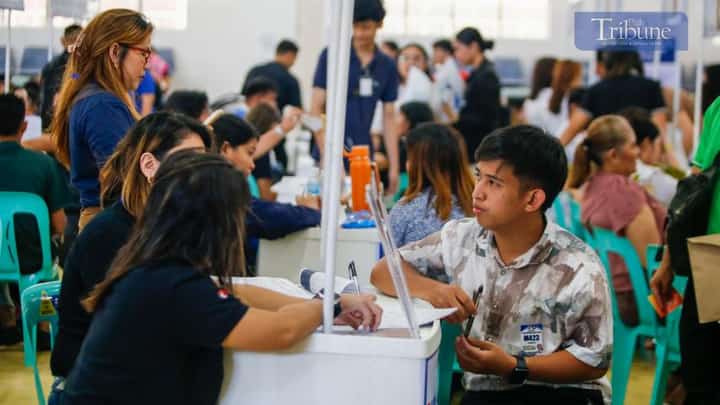 Job seekers troop to Manila Science High School in Ermita, Manila, on 01 May 2025, where almost 10,000 vacancies are being offered across various industries such as business process outsourcing (BPO), wholesale and retail trade, construction, and manufacturing (TOTO LOZANO)