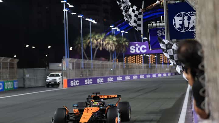Oscar Piastri crosses the finish line to win the 2025 Saudi Arabia Formula One Grand Prix at the Jeddah Corniche Circuit.