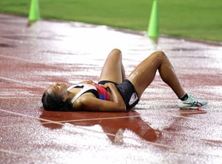 SLIP KNOTT: Fil-Am sprinter cops gold with sliding finish