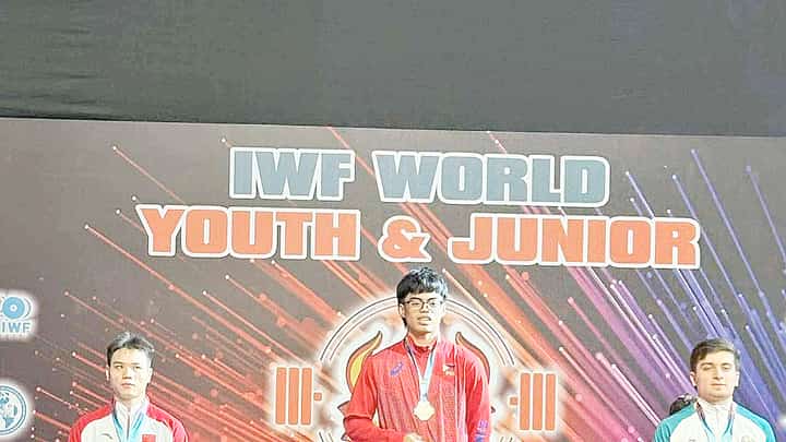 Albert Delos Santos (middle) makes heads turn in the IWF World Youth and Junior Championships in Lima, Peru.