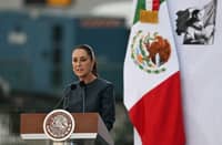Mexican President Claudia Sheinbaum speaks at the opening of the Mexico 2025 Aerospace Fair at Santa Lucia Air Base near Mexico City on 22 April 2025. Sheinbaum recently revealed rejecting Trump’s proposal to send US troops to combat cartels.