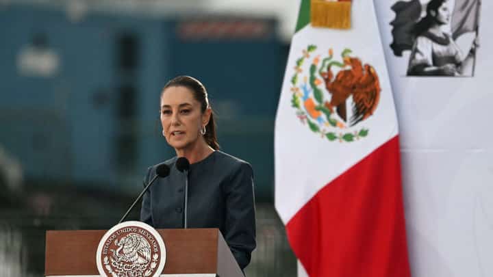Mexican President Claudia Sheinbaum speaks at the opening of the Mexico 2025 Aerospace Fair at Santa Lucia Air Base near Mexico City on 22 April 2025. Sheinbaum recently revealed rejecting Trump’s proposal to send US troops to combat cartels.