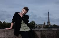 French Artistic Director for the Opening and Closing Ceremonies of the Paris 2024 Olympic and Paralympic Games Thomas Jolly, poses near the Seine River on 2 July 2024.