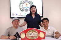 IBF champion Pedro Taduran (right) strikes a pose with his confident team made up of lead trainer Carl Peñalosa Jr. (left) and chief handler Cucuy Elordo.