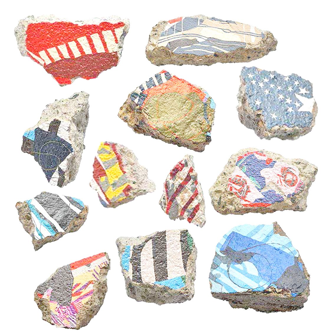 Poklong Anading, ‘fallen map 208-219,’  2024, Acrylic paint on concrete rubble, dimensions variable. Anading uses found concrete rubble, and renders patterns from ‘trapo’ or rag,using acrylic paint on the flat.
