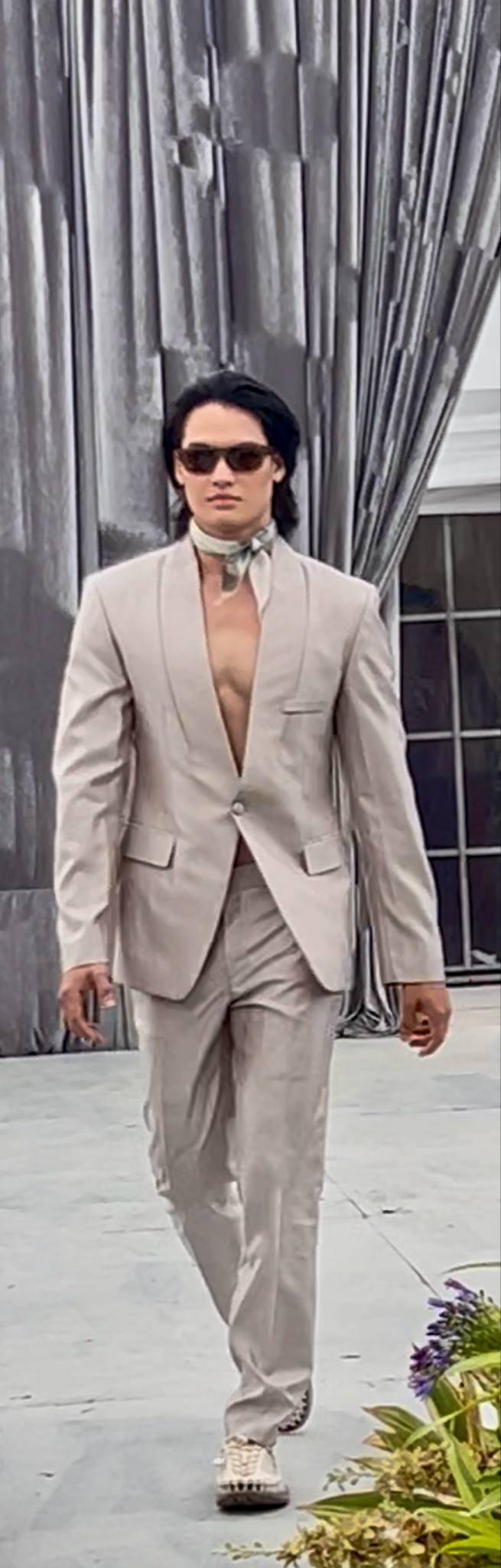 Summer linen suit with silk scarf as accent.