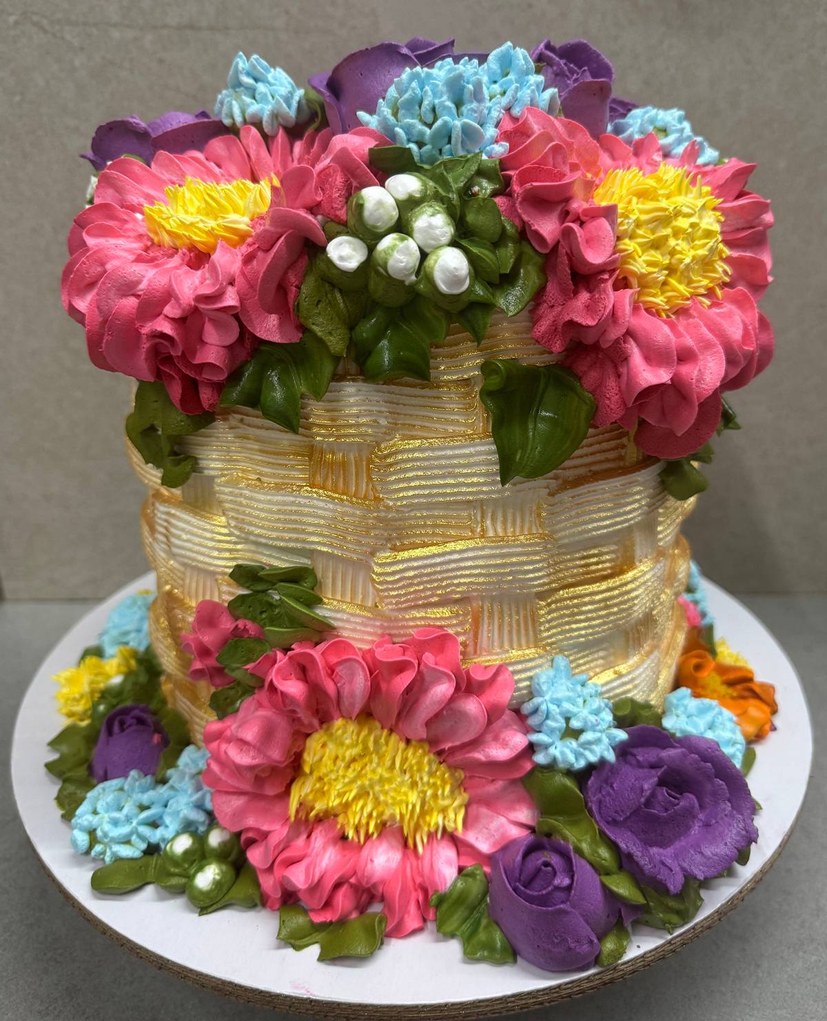 Marlene Monfort’s Basket Weave Tower Cake with Spring Florals.